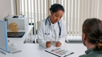 Female doctor reviewing results with patient